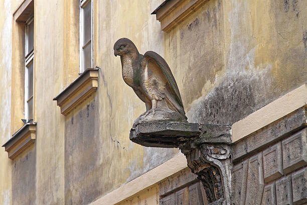 A Stone Eagle Sculpture on a Wall of an Old House in Prague