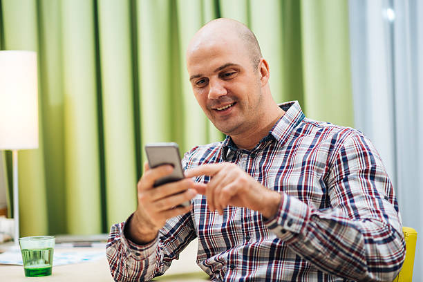 istock Businessman sitting in office and using mobile phone for comunication 506072584