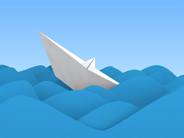 istock 3d paper boat sinking in ocean wave 506097034
