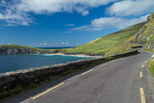 Southwestern Ireland seascape depicting a beautiful highway drive along the shoreline.