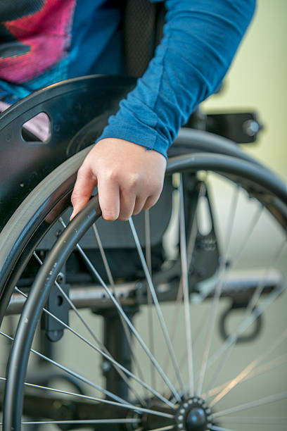 istock Hands Gripping a Wheelchair 506098044