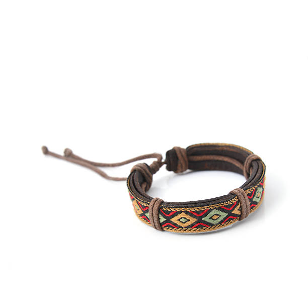 istock closeup men's leather bracelet on white background 506100292