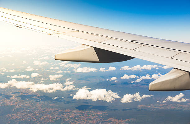 istock View of window of wing airplane 506100976