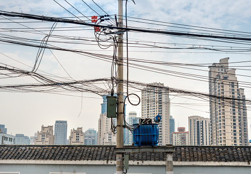 Chaotic wire pole mess, was taken on the Renmin road, Shanghai.