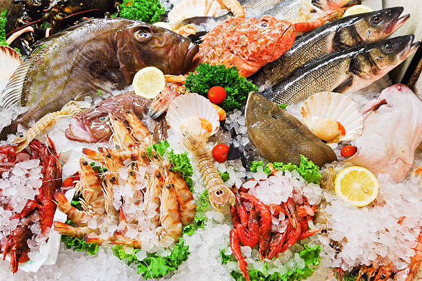 istock raw fish and seafood in ice 506102267
