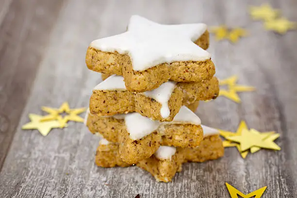 stacked xmas cookies with golden stars