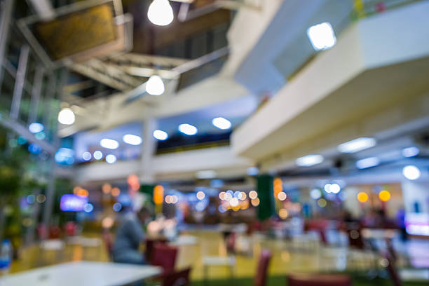 istock blurred shopping mall center 506105828