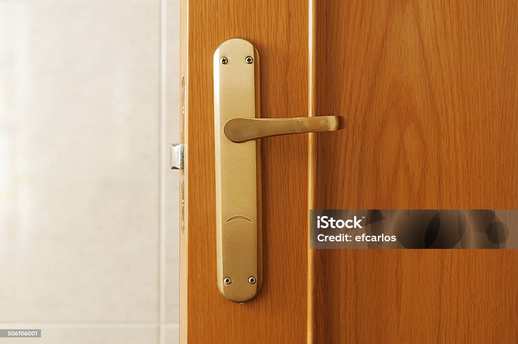 Sad door handle Sad lever-style door handle Brown Stock Photo