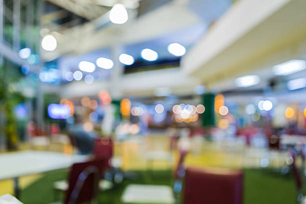 istock blurred shopping mall center 506106060