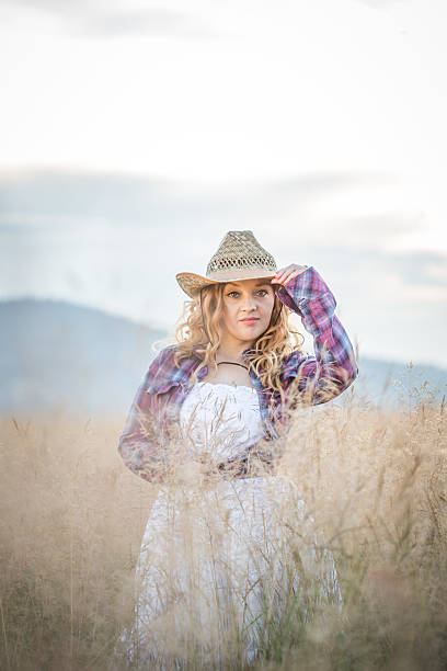 istock Country girl in grass 506106519