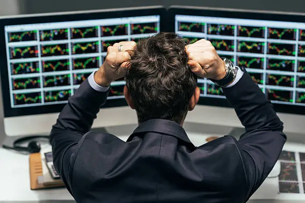 Photo of Stressed trader