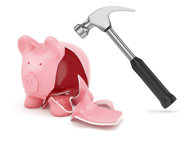 istock Hammer and broken piggybank 506107275