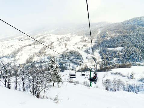 cableway ski lift in skiing area Via Lattea, Italy
