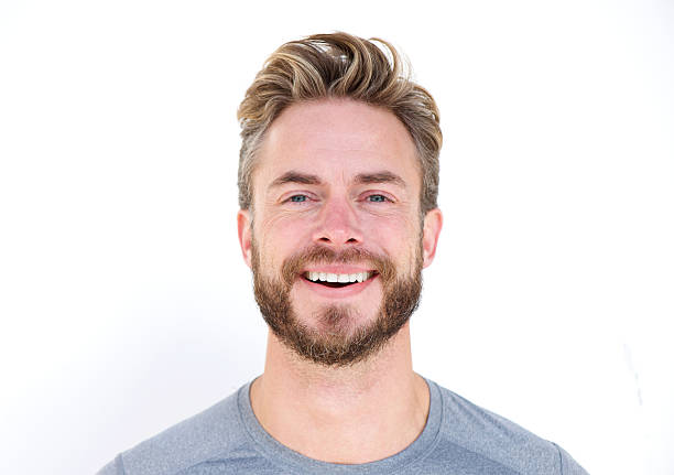 istock Close up portrait of a man with beard laughing 506115942