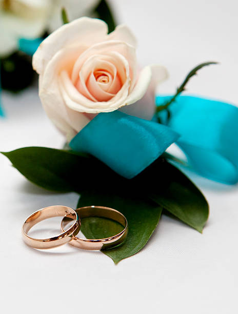 istock Wedding gold rings bride and groom 506117450