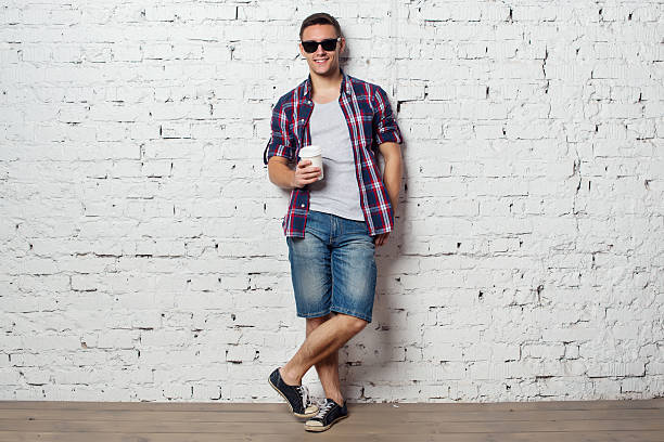 istock Bright young man hipster on vacation enjoying the day with 506121352