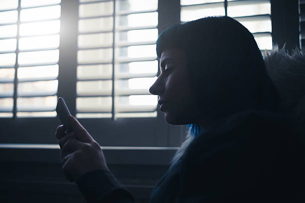 istock Young woman using smartphone at home 506122806