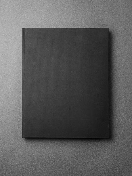 istock Black book cover on the gray background 506122854
