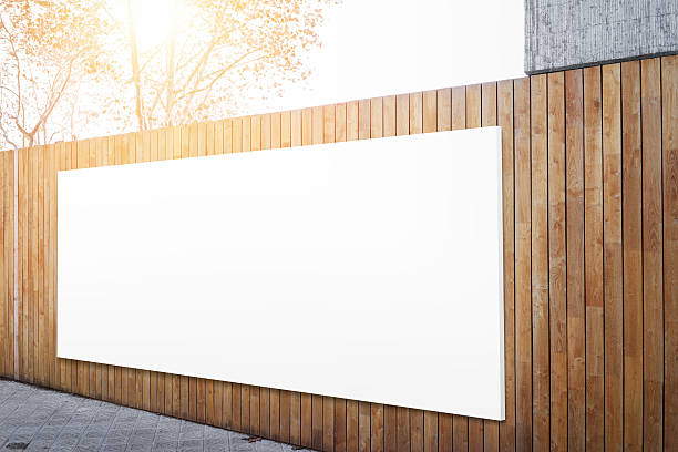 istock Billboard Handing on the wood wall. Horizontal 506123452
