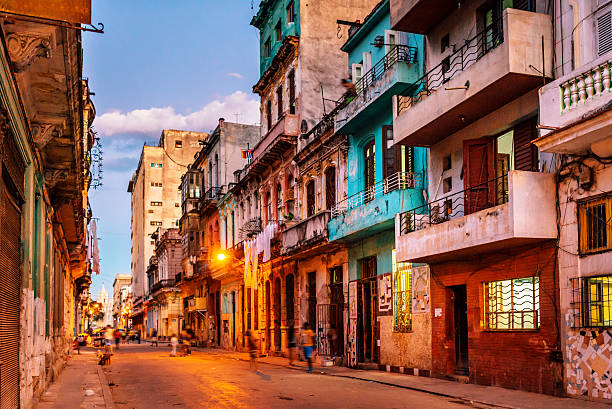 streets of havana, cuba at dusk streets of havana, cuba at dusk old havana stock pictures, royalty-free photos & images