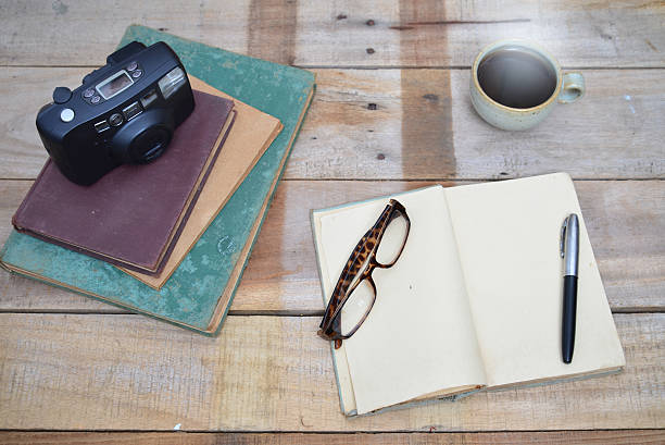 istock cup of the coffee and vintage book. 506132532