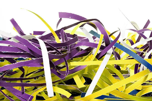 Colorful shredded paper stripes with white background