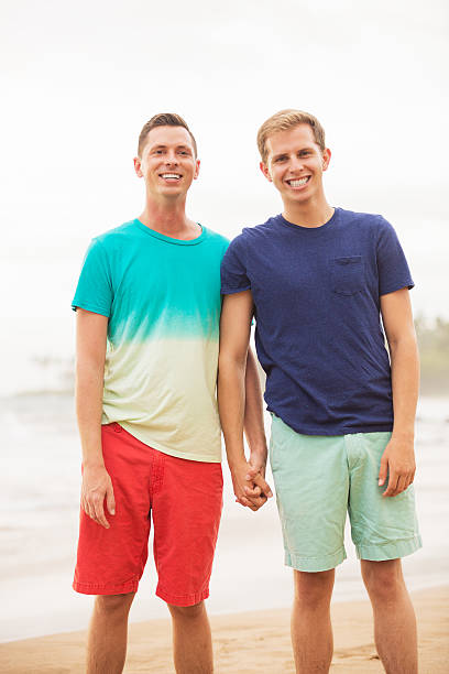 istock Gay couple on the beach 506132705