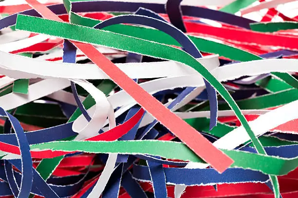 Colorful shredded paper stripes with white background