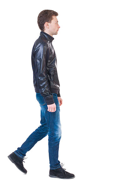 istock Back view of going  handsome man in jacket. 506133260