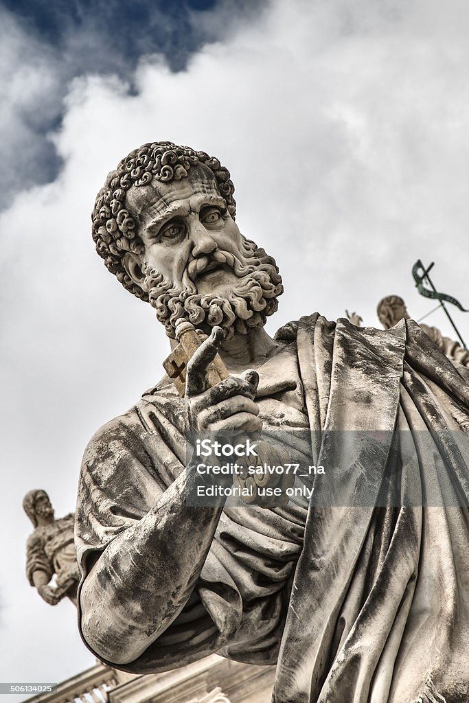 Statue of St. Peter Rome, Italy - July 12, 2014: Detail of the statue of St. Peter with the key in front of the cathedral of San Pietro. The Basilica of St. Peter is the main church papal primary symbol of Catholicism. Apostle - Worshipper Stock Photo