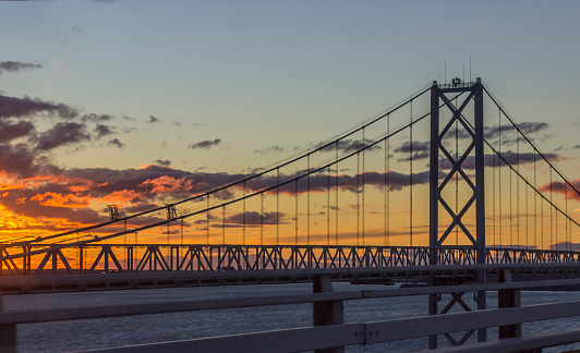 the route 50 chesapeake bay bridge in maryland at a colorful sunset