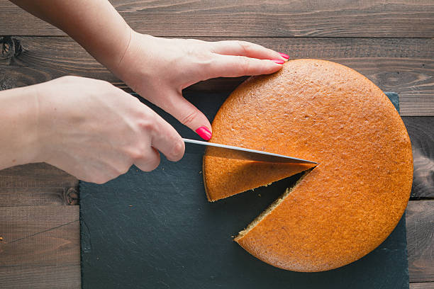 Woman hands cutting manna pie