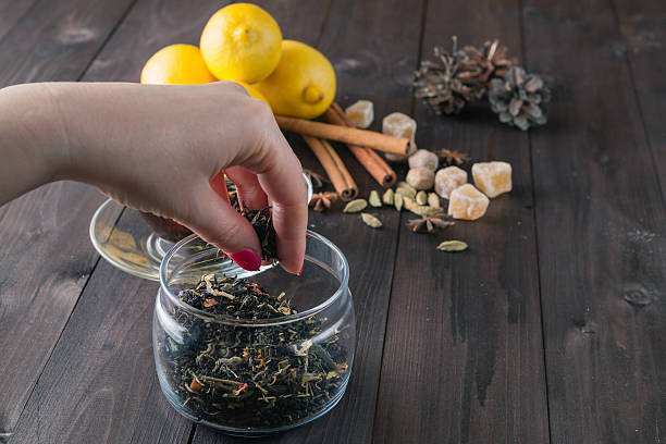 istock Woman strew herbal tea 506137424