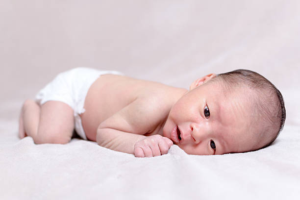 istock Chinese baby laying on tummy 506138016
