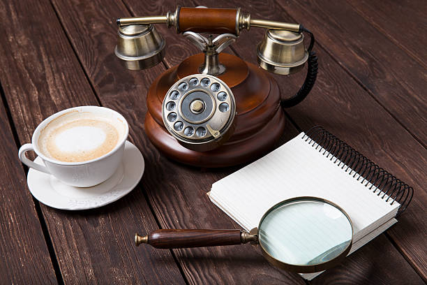 istock Notebook with a pen  next to coffee and telefon 506138944