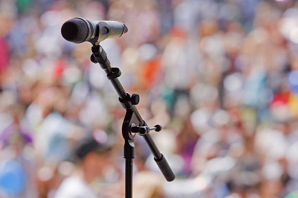 istock Microphone awaiting the next performer at an outside event UK 506139100