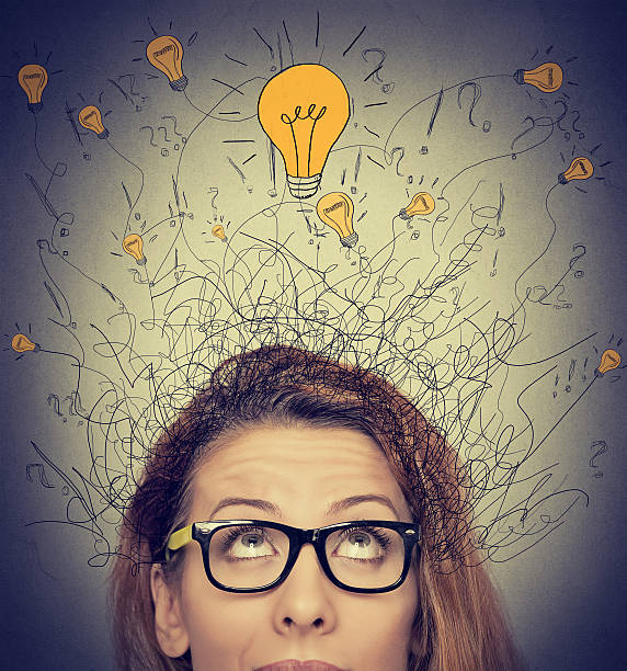 istock woman looking up has ideas 506139302