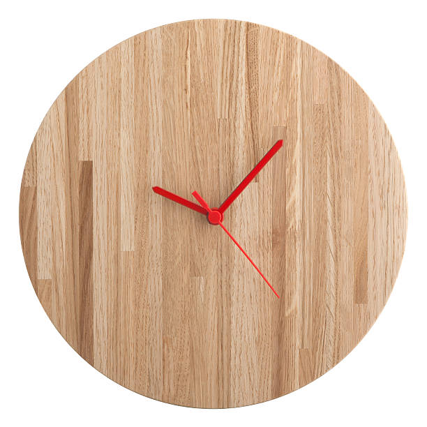 Wooden wall clock isolated on white background