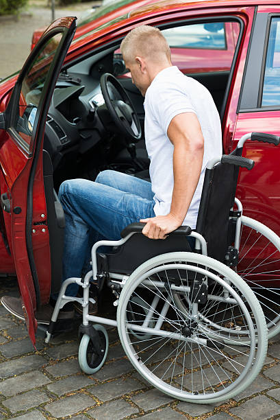 istock Handicapped Man Boarding In His Car 506143480