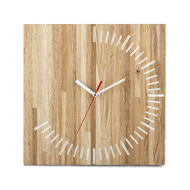 istock Simple wooden wall watch - clock isolated on white background 506144102