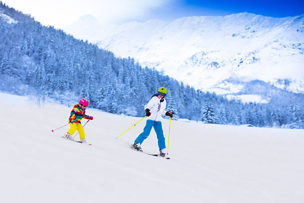 istock Kids skiing in the mountains 506145464