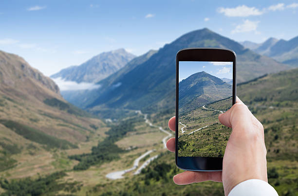 istock Person Hand Photographing Landscape 506145470
