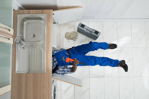 istock Handyman Repair Sink In Kitchen 506145790