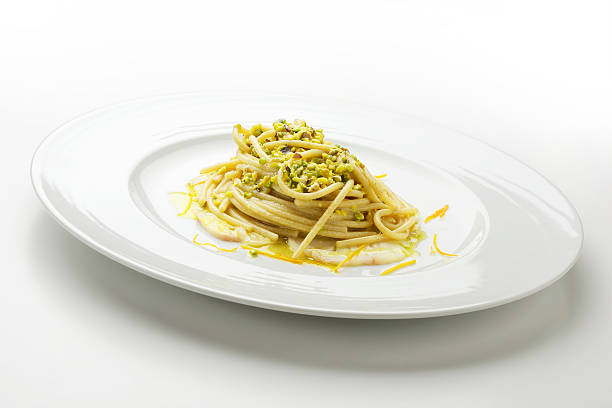 istock Spaghetti with pistachio and citrus yellowtail 506146746