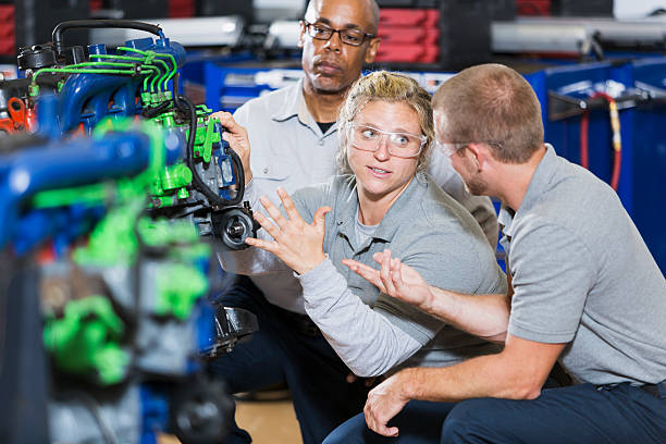istock Vocational class, learning to repair diesel engine 506147328