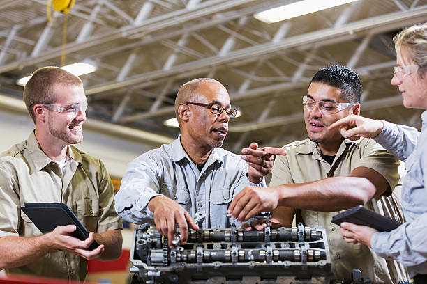 istock Vocational class, learning to repair gasoline engine 506147362