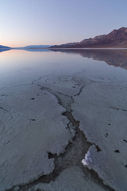 istock Crack In The Wet Earth 506148184
