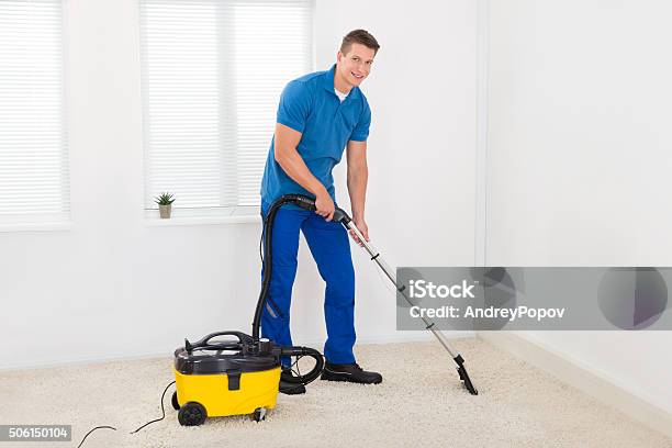 Janitor Cleaning Carpet Stock Photo - Download Image Now - Carpet - Decor, Washing, Cleaning