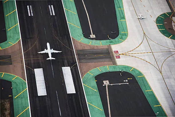 Photo of Aerial View of a Passenger Jet on the Runway