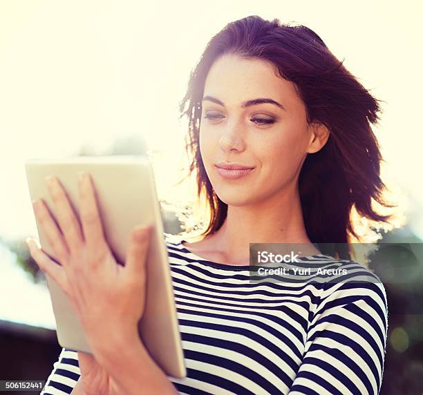 Browsing Her Favorite Sites Stock Photo - Download Image Now - 20-24 Years, 20-29 Years, Adult